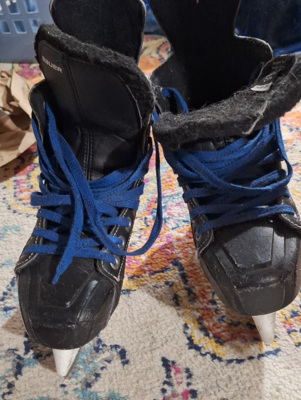 Bauer Black Hockey Skates with Blue Laces